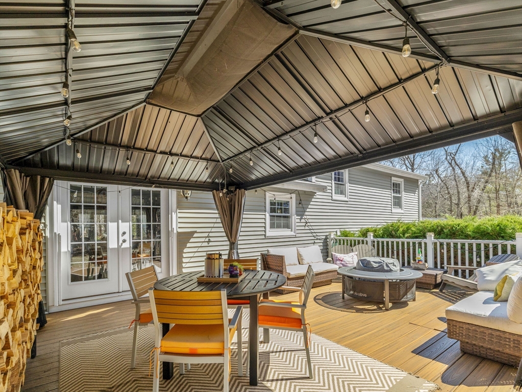 237 York Street Canton, MA 02021 - Photo 39 of 42 a view of a patio with a table and chairs