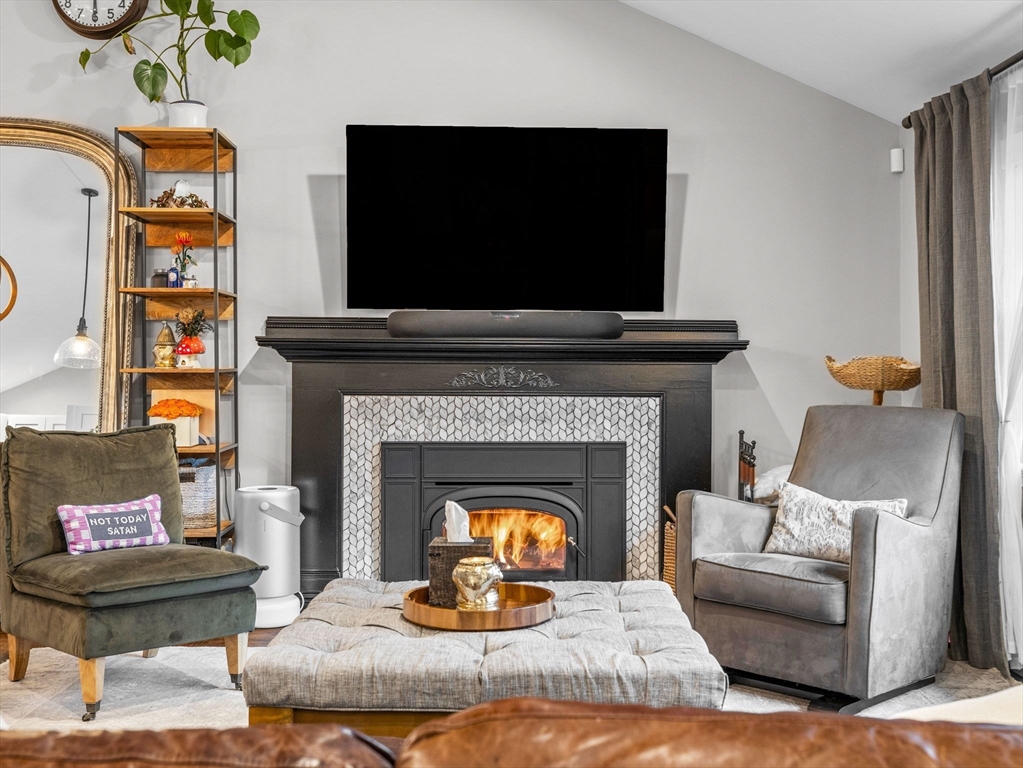 237 York Street Canton, MA 02021 - Photo 5 of 42 a living room with furniture and a fireplace