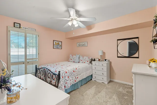 a view of a swimming pool with an outdoor seating