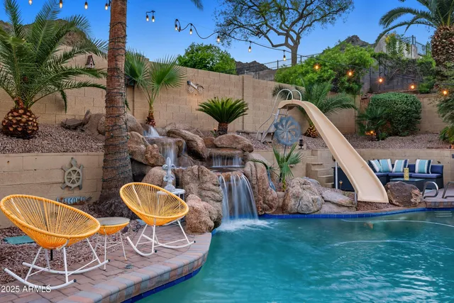 a view of a backyard of the house