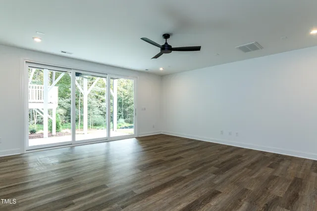 a view of a kitchen with a sink and cabinets