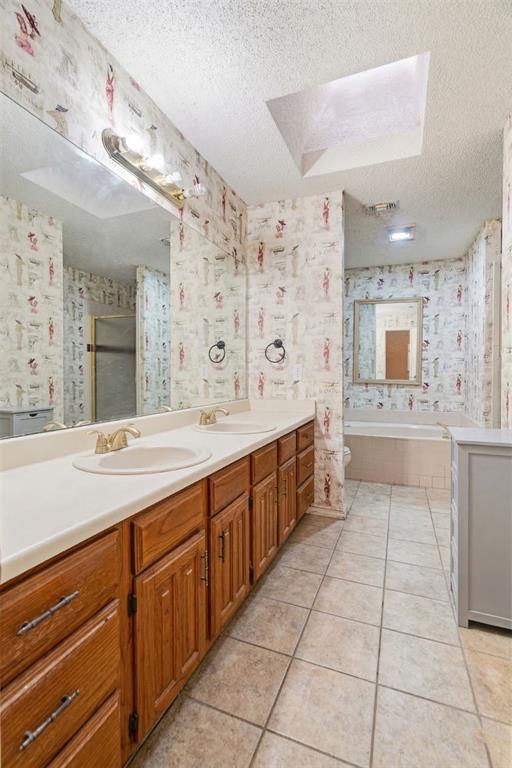 4315 Lakeshore Drive Reno, TX 75462 - Photo 11 of 20 a large white bathroom with a large mirror shower and vanity