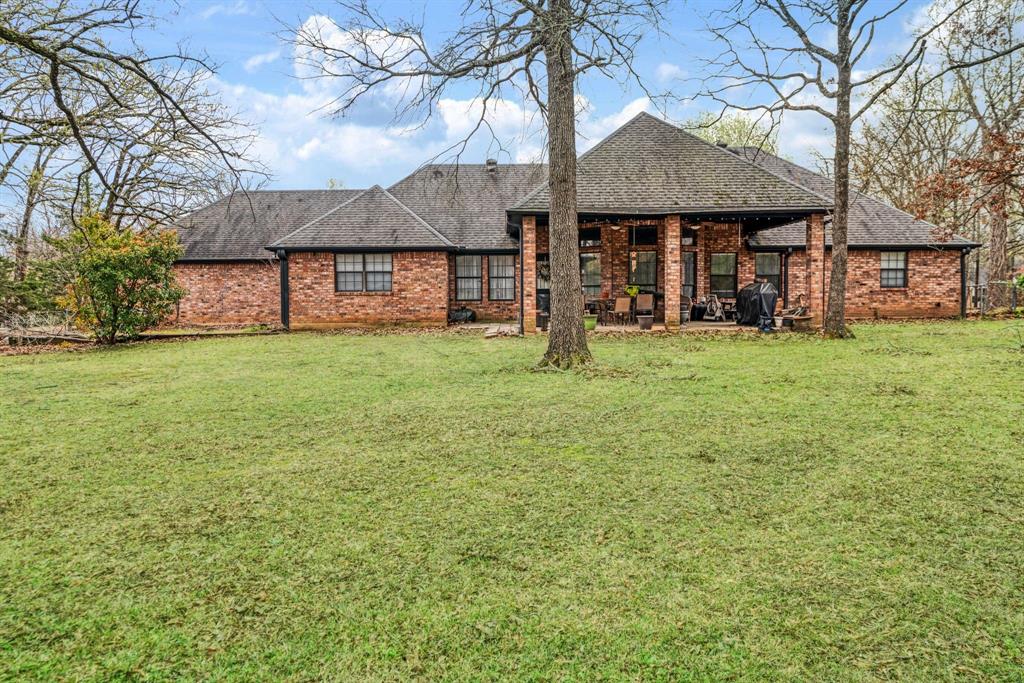 4315 Lakeshore Drive Reno, TX 75462 - Photo 17 of 20 a house view with a garden space