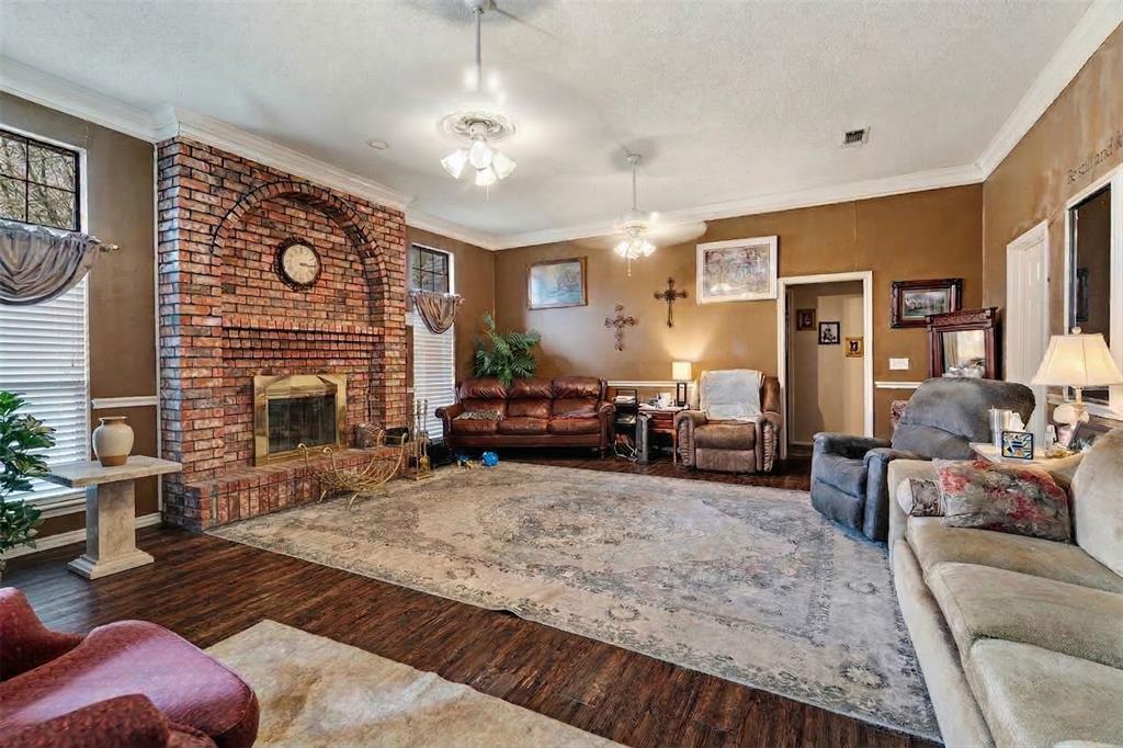 4315 Lakeshore Drive Reno, TX 75462 - Photo 3 of 20 a living room with furniture large window and a fireplace