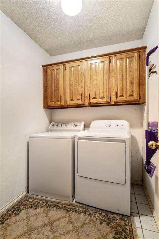 4315 Lakeshore Drive Reno, TX 75462 - Photo 9 of 20 a utility room with dryer and washer