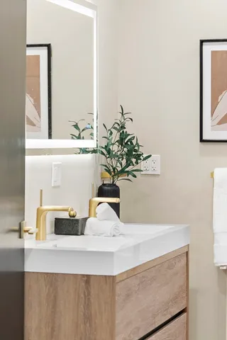 a close view of sink and a mirror