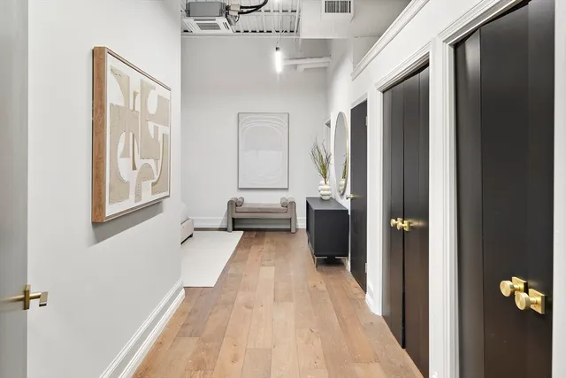 a view of a living room with windows