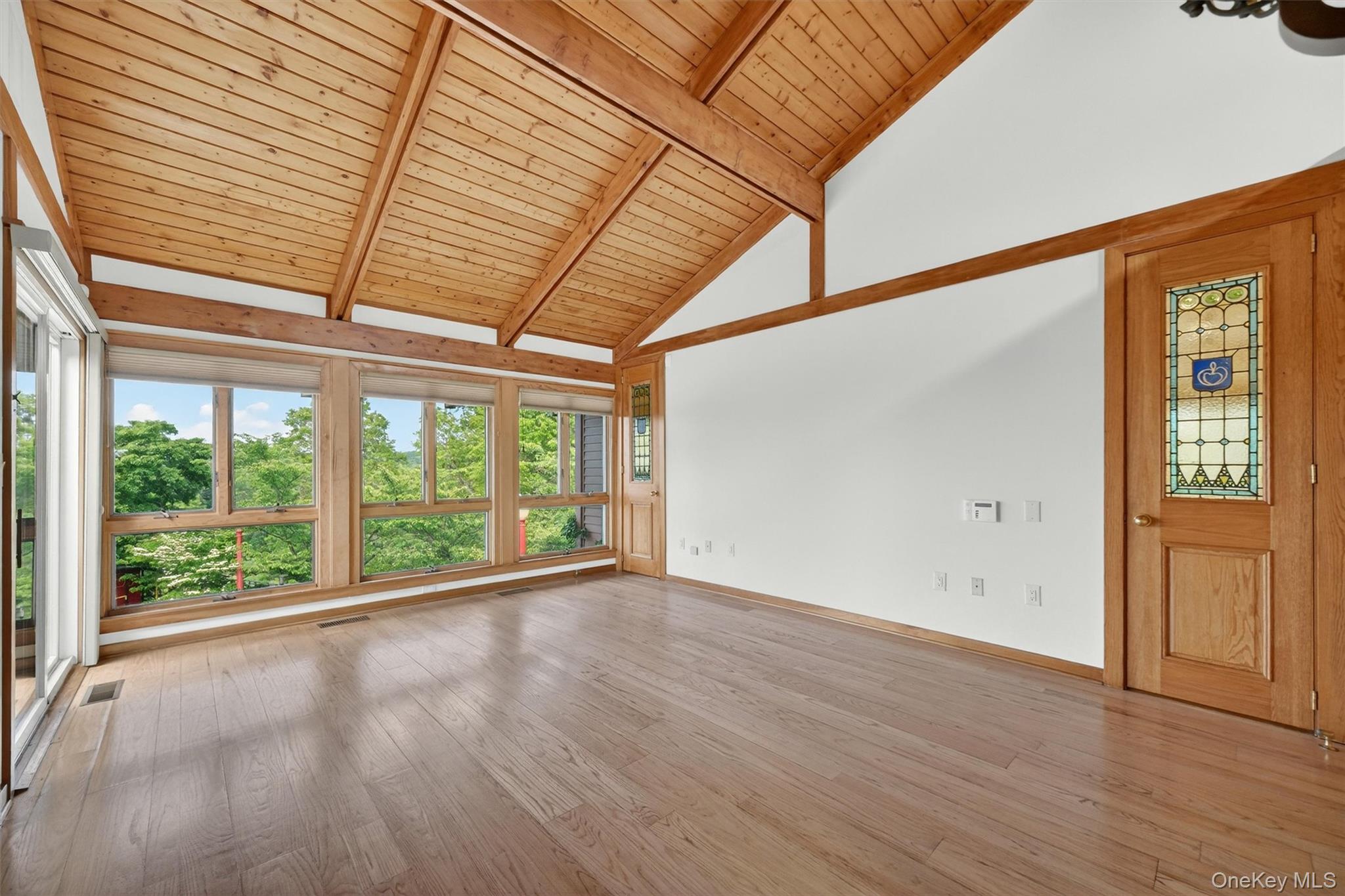165 Hasbrouck Road Goshen, NY 10924 - Photo 24 of 50 The primary suite is light and bright with walls of windows and a fabulous view of the pool deck, farm and beyond