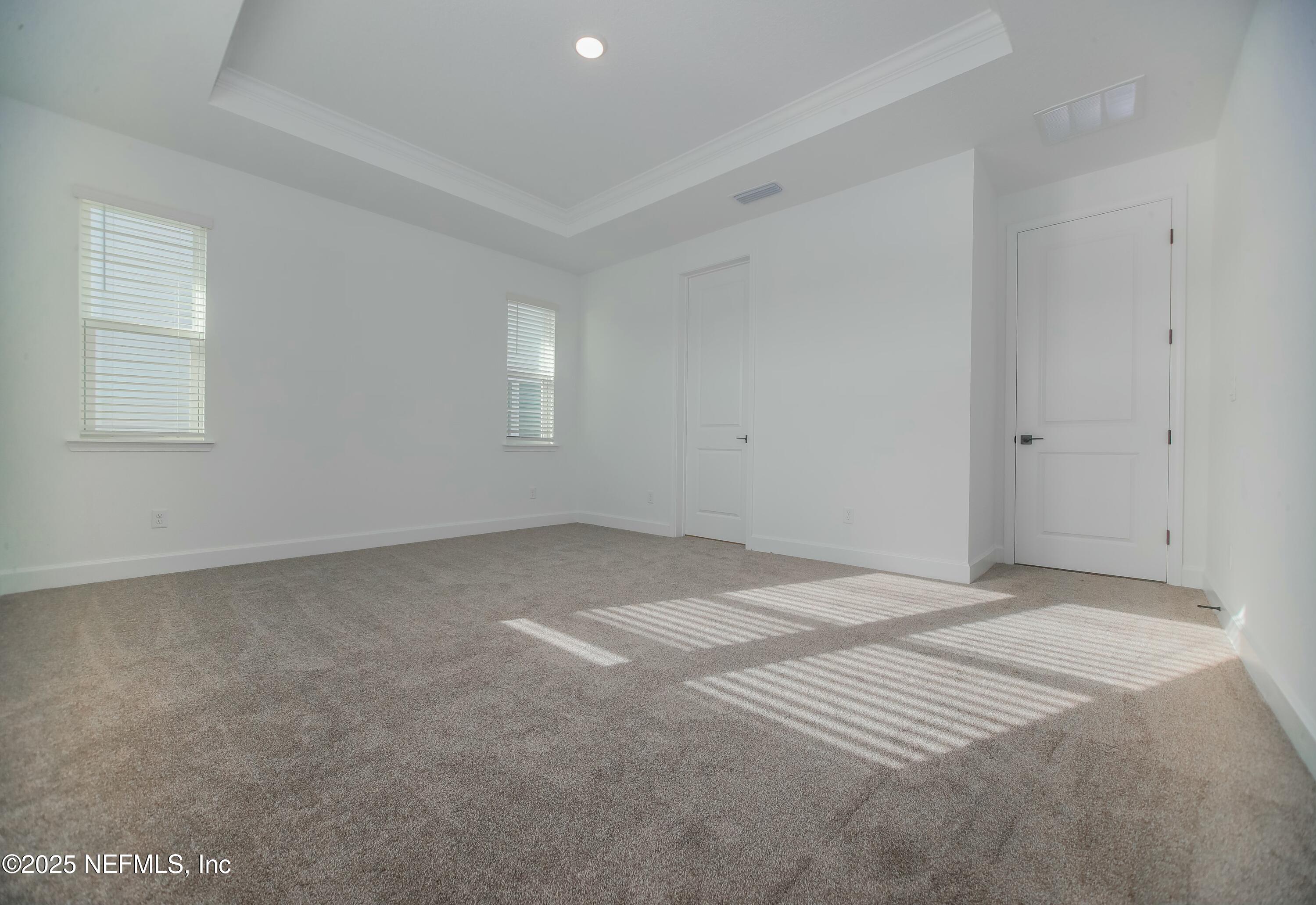 2526 Trailmark Drive St. Augustine, FL 32092 - Photo 11 of 46 a view of an empty room with a window