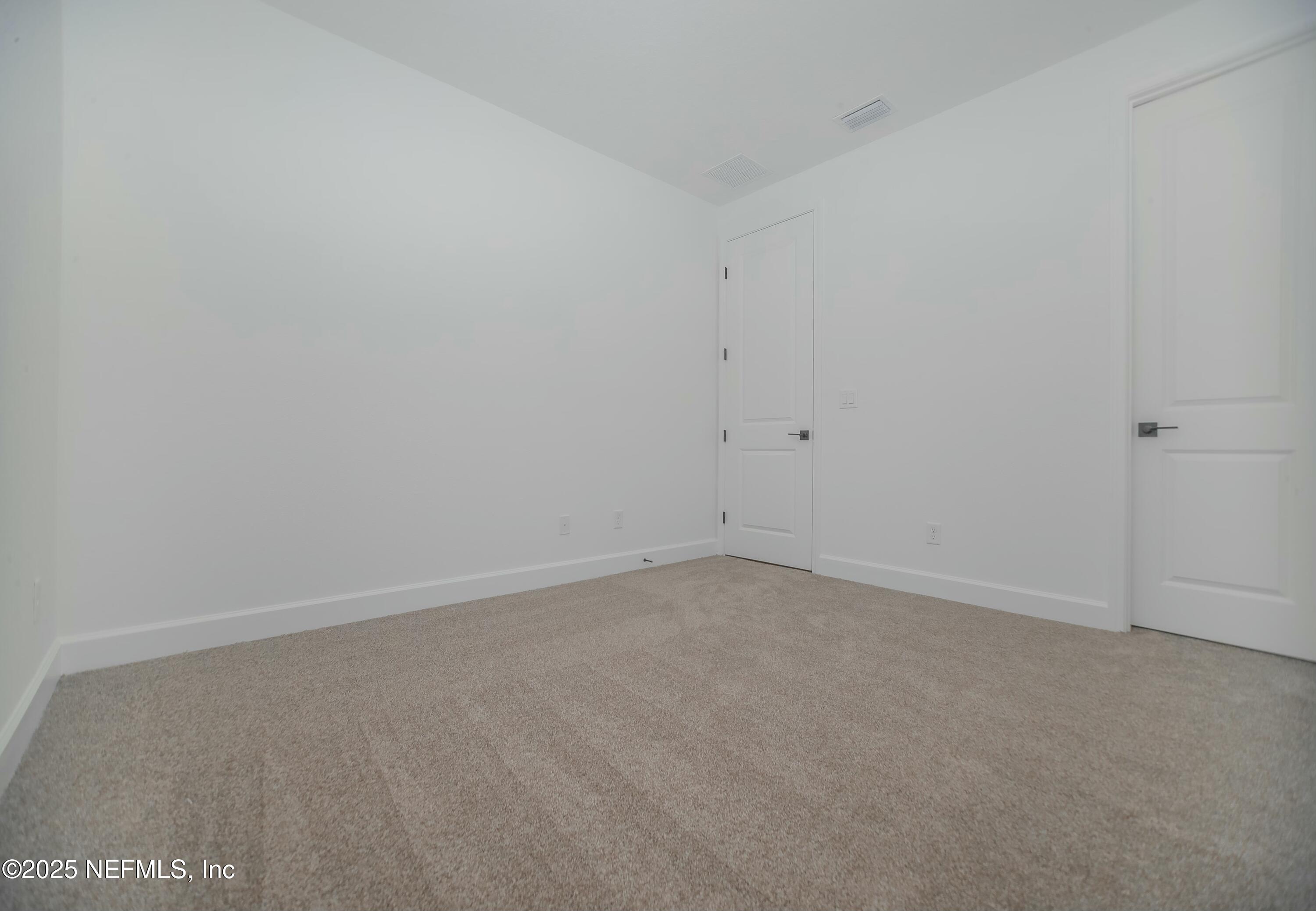 2526 Trailmark Drive St. Augustine, FL 32092 - Photo 23 of 46 a view of an empty room