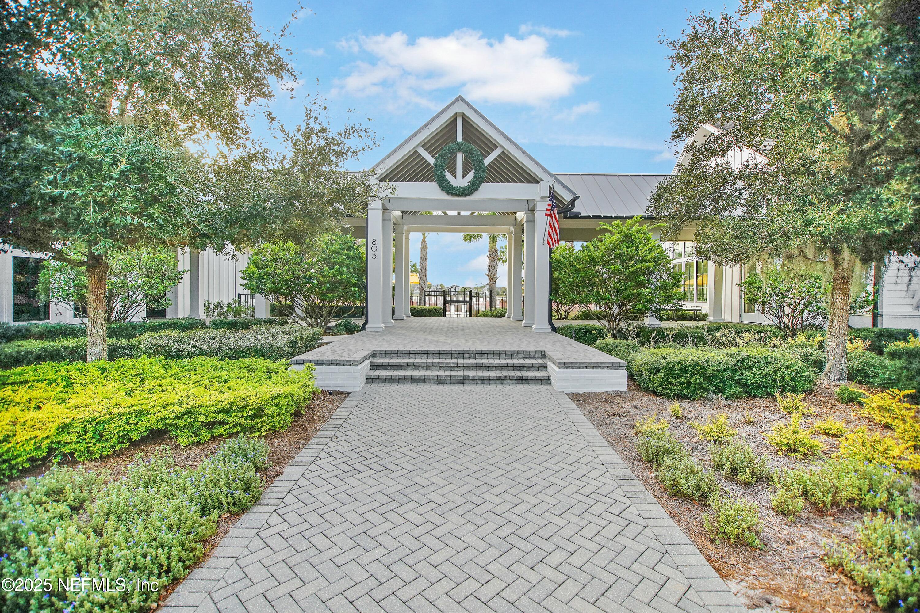 2526 Trailmark Drive St. Augustine, FL 32092 - Photo 29 of 46 a front view of a house with a yard