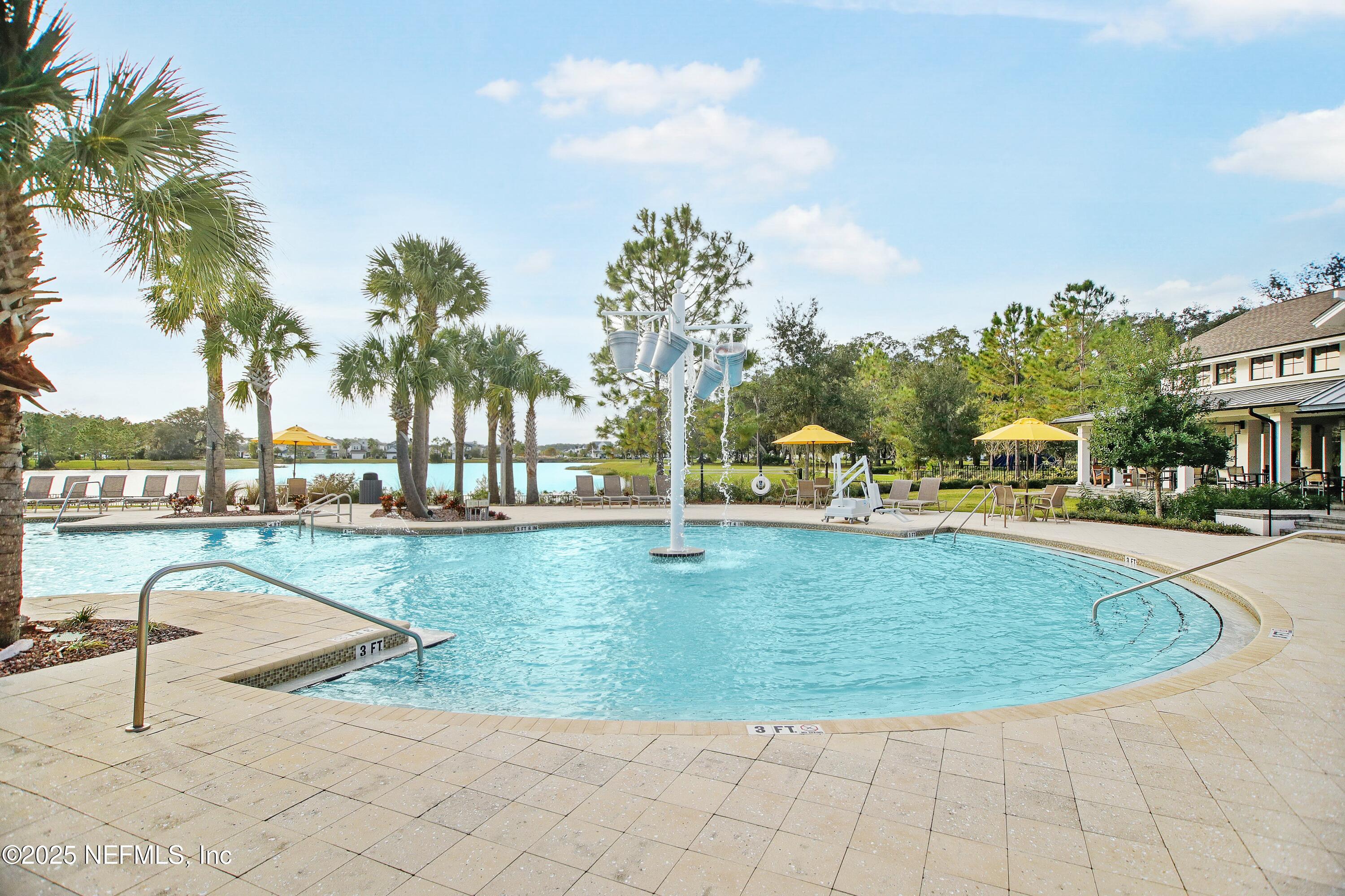 2526 Trailmark Drive St. Augustine, FL 32092 - Photo 31 of 46 a view of a swimming pool with a patio