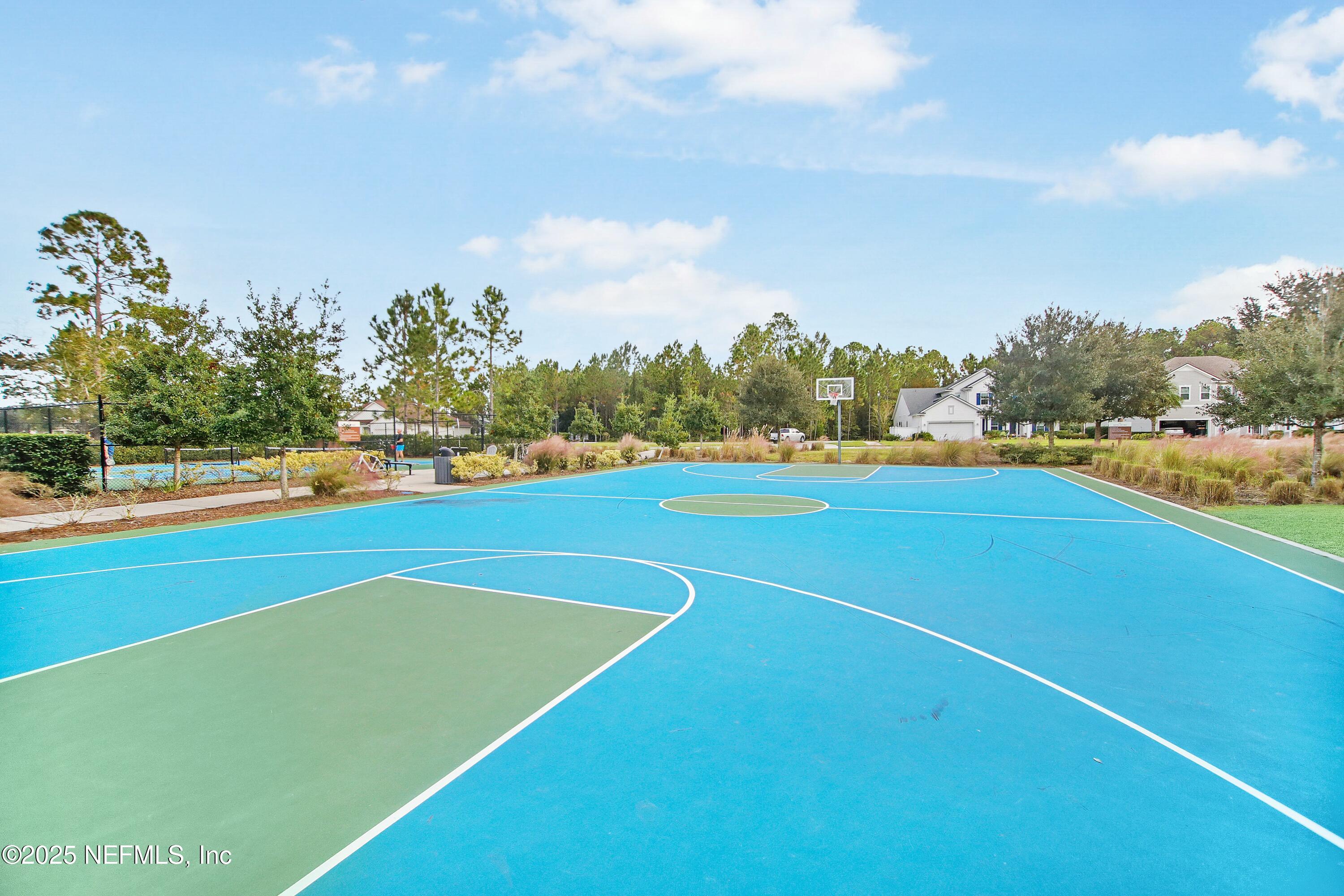 2526 Trailmark Drive St. Augustine, FL 32092 - Photo 35 of 46 a view of an outdoor space and basketball court