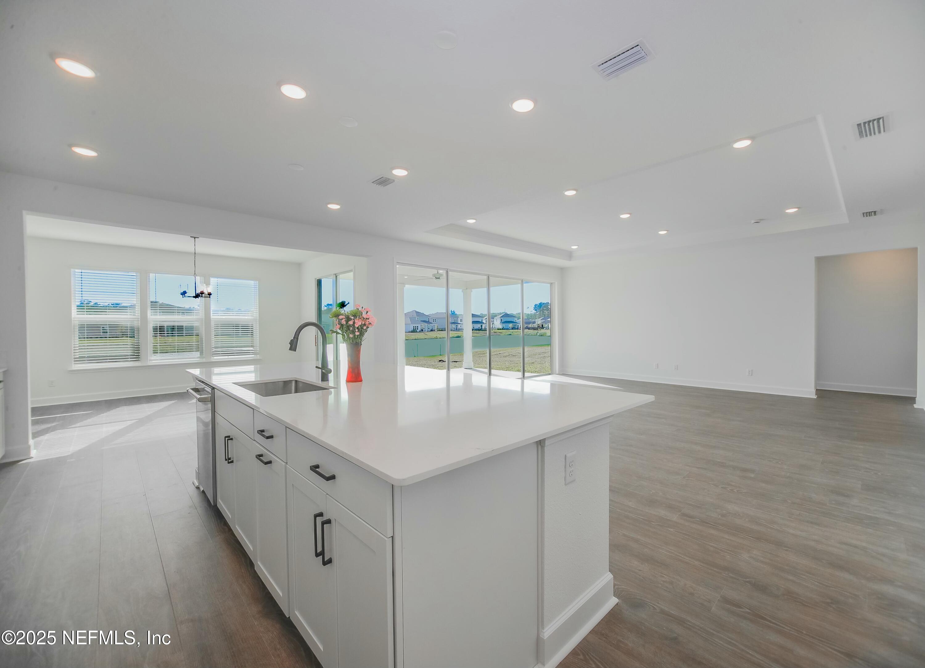 2526 Trailmark Drive St. Augustine, FL 32092 - Photo 7 of 46 a kitchen with sink and cabinets