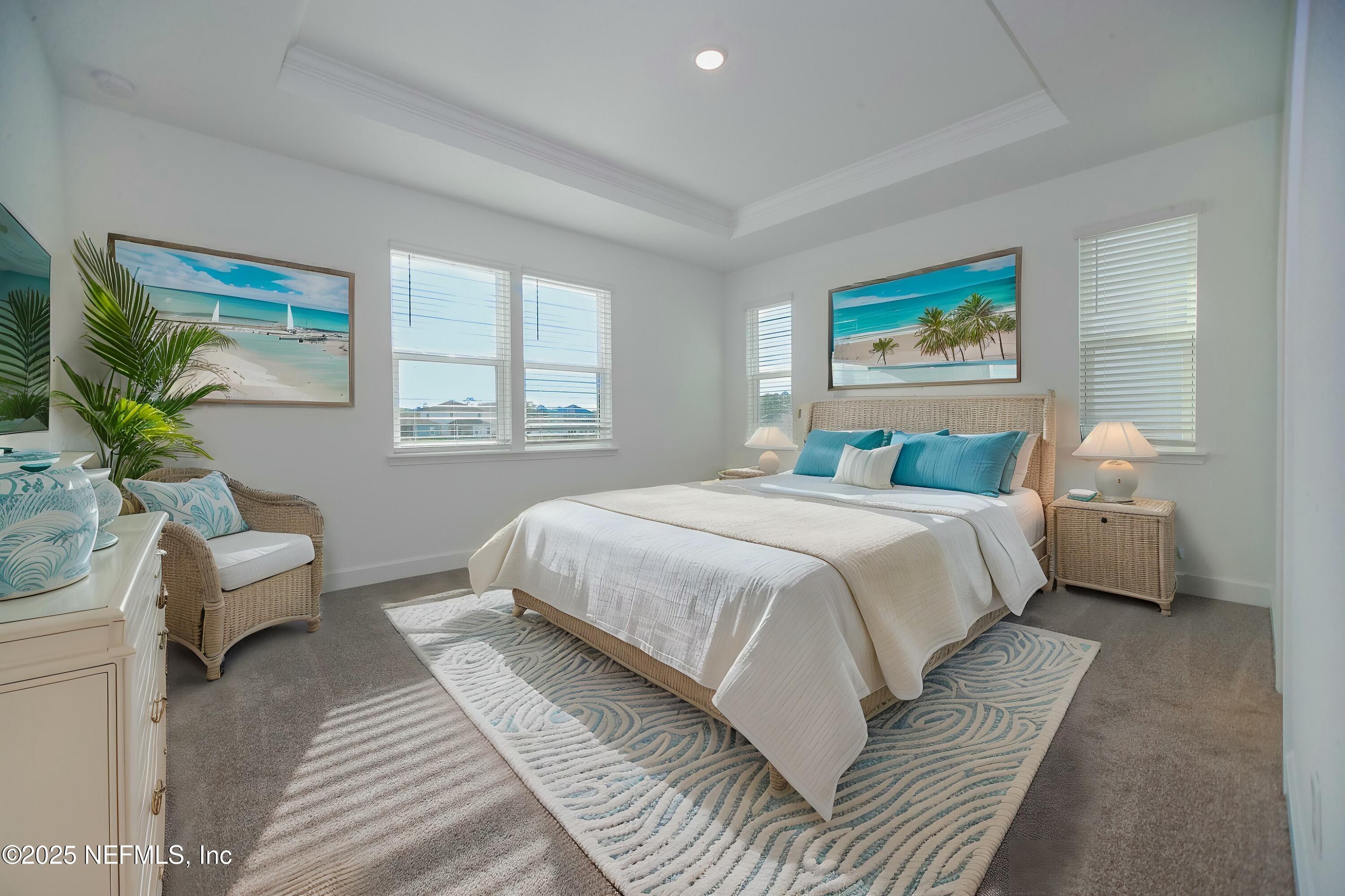 2526 Trailmark Drive St. Augustine, FL 32092 - Photo 10 of 46 a bedroom with bed and a couch