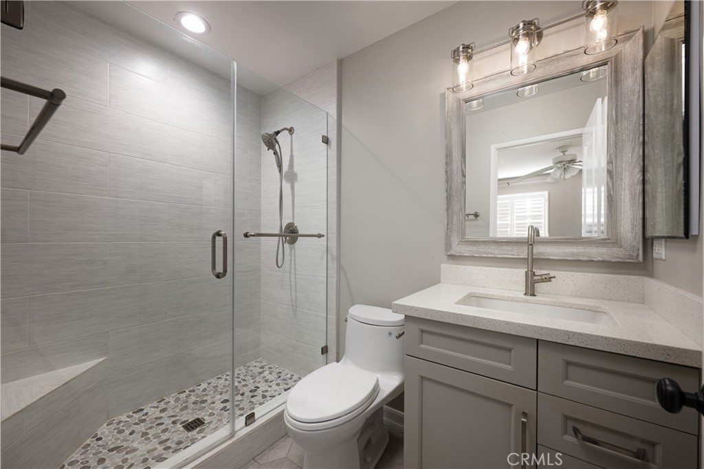 14241 Blackpool Road Westminster, CA 92683 - Photo 11 of 31 a bathroom with a sink toilet and shower