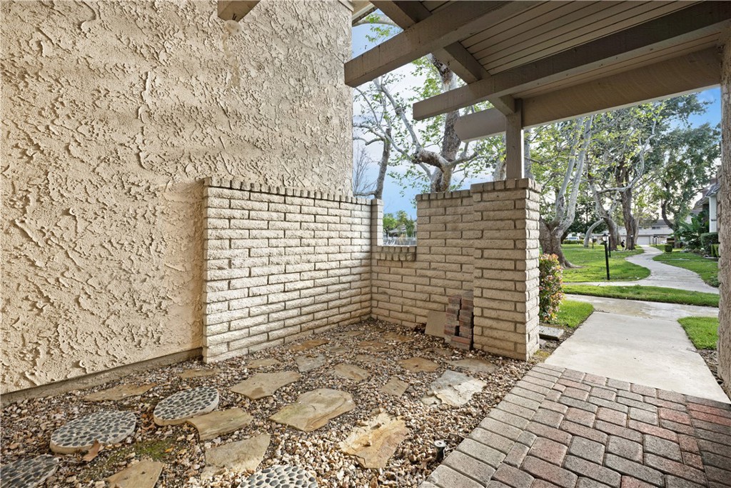 14241 Blackpool Road Westminster, CA 92683 - Photo 21 of 31 a view of a pathway both side of house