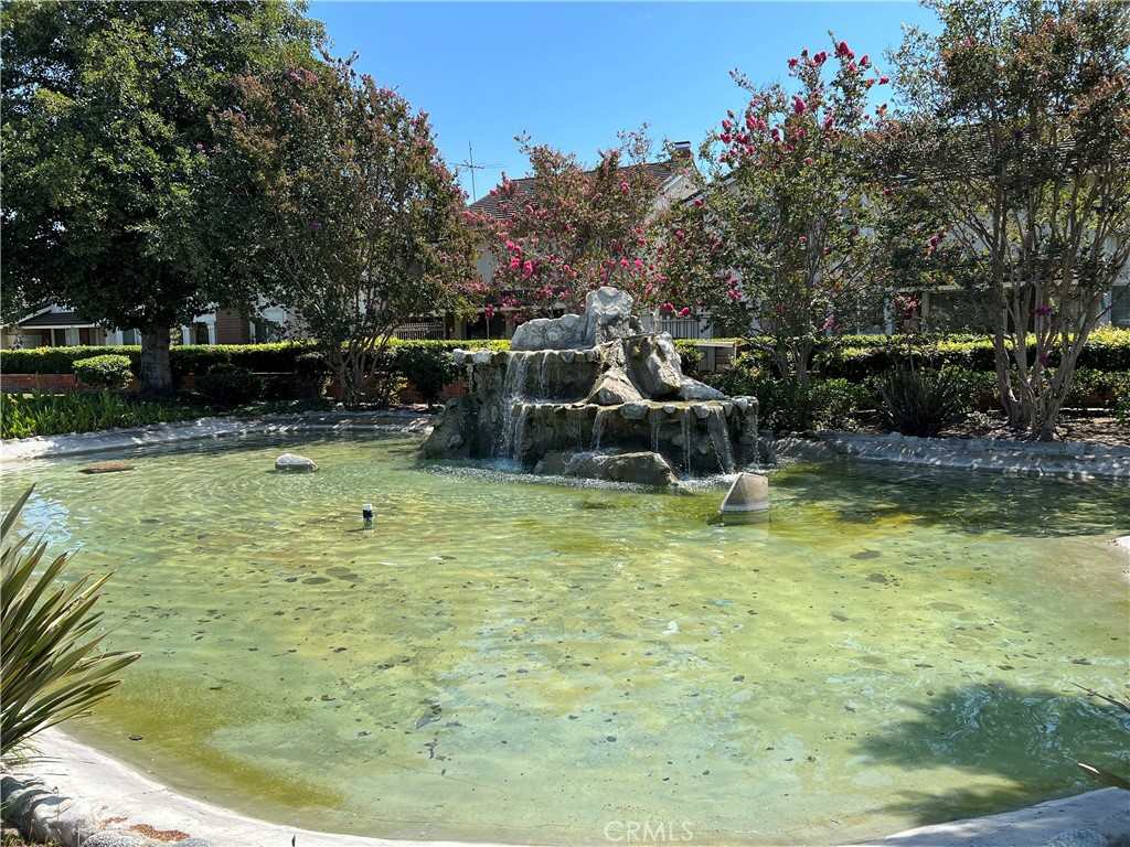 14241 Blackpool Road Westminster, CA 92683 - Photo 26 of 31 a view of a swimming pool with a sitting area