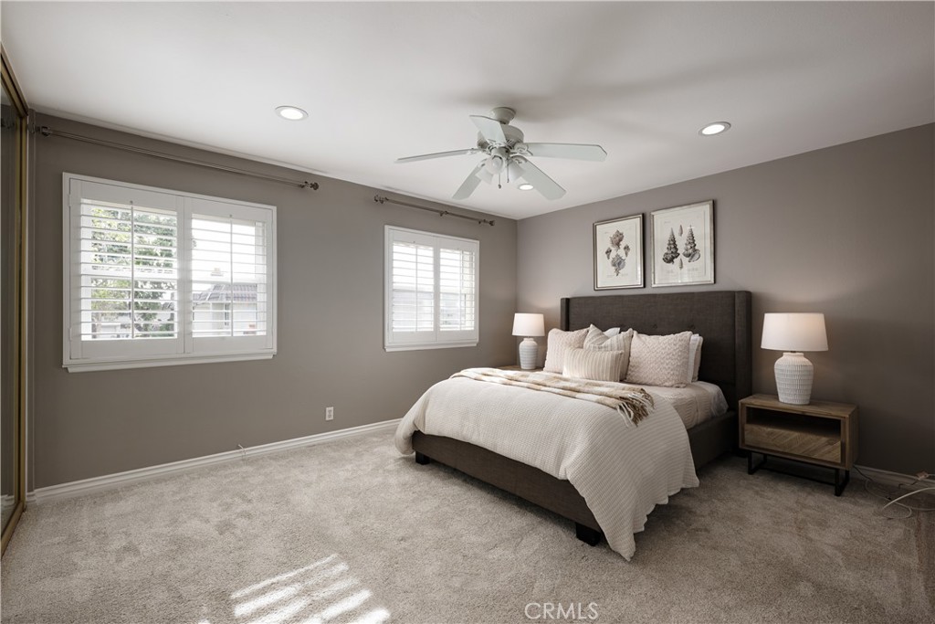 14241 Blackpool Road Westminster, CA 92683 - Photo 10 of 31 a bedroom with a large bed and a window