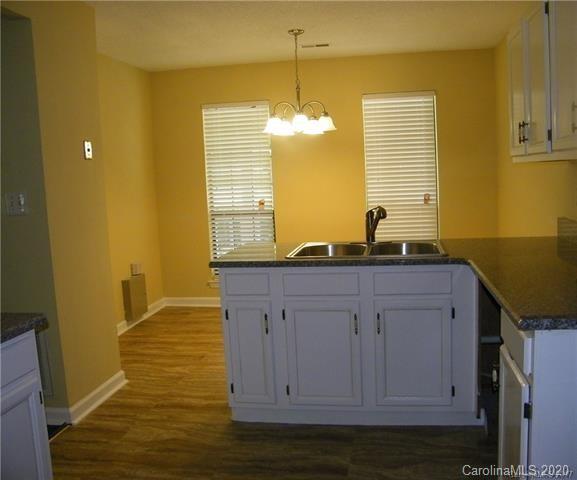 9301 Chislehurst Road Mint Hill, NC 28227 - Photo 6 of 9 a bathroom with a sink and a vanity