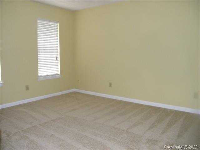 9301 Chislehurst Road Mint Hill, NC 28227 - Photo 7 of 9 an empty room with a window