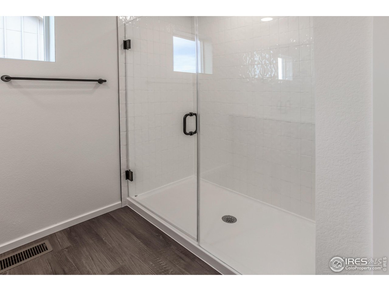 768 Chatter Road Windsor, CO 80550 - Photo 23 of 37 a bathroom with a bath tub