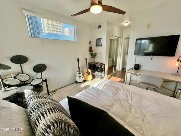 a view of living room with a bed