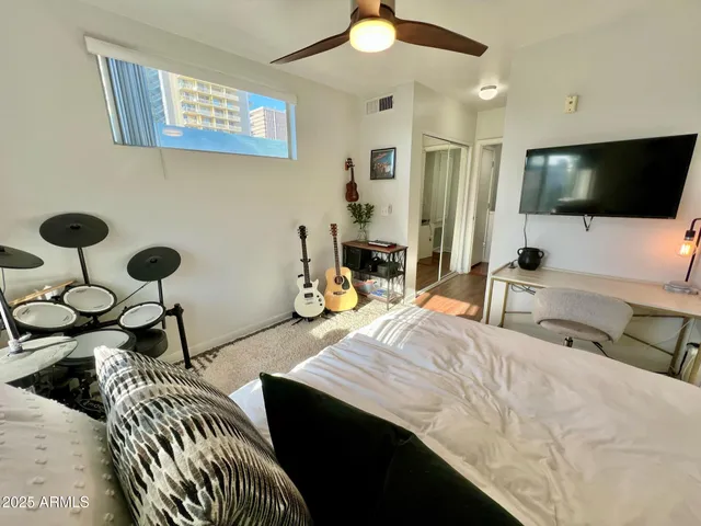 a view of living room with a bed