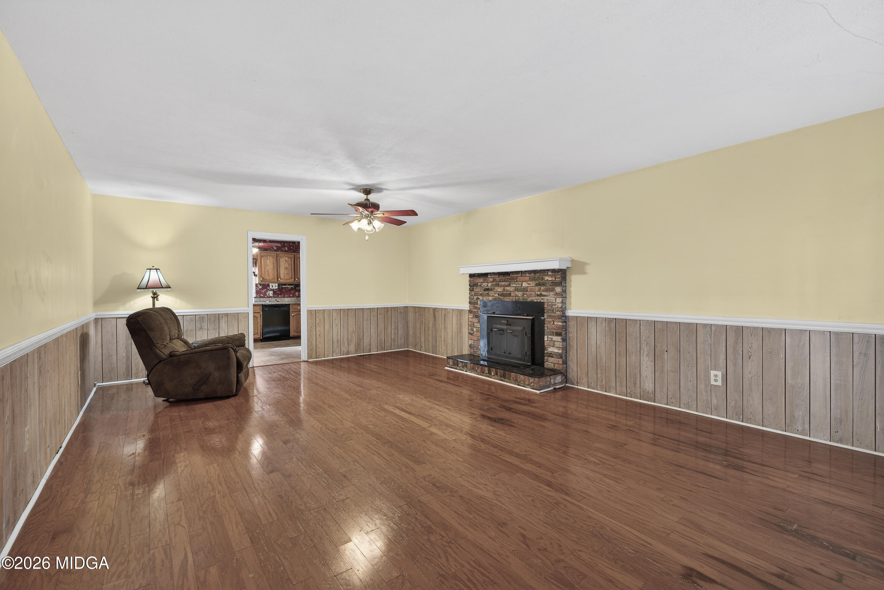 337 Highway 18 Gray, GA 31032 - Photo 12 of 50 a living room with furniture and a fireplace
