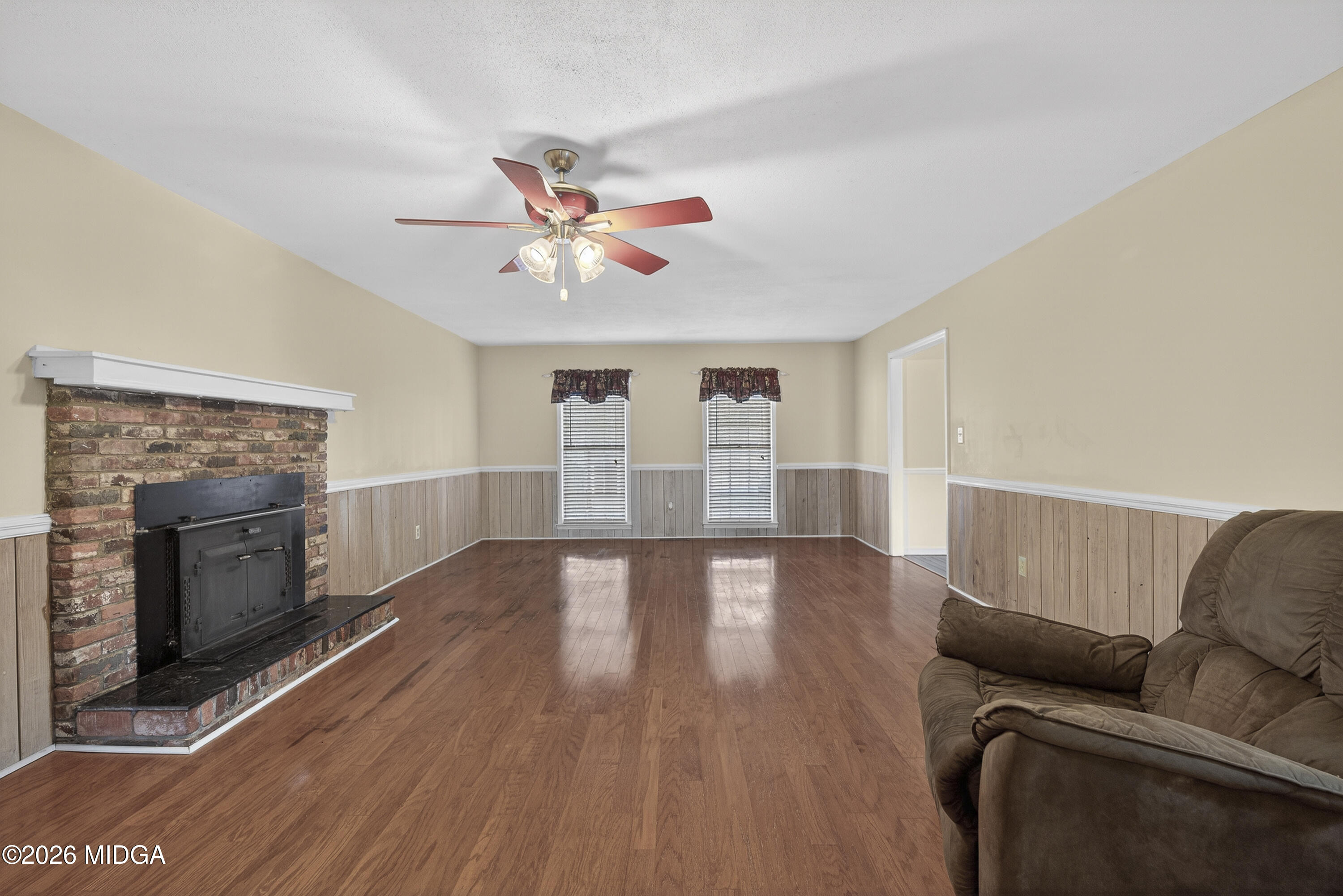 337 Highway 18 Gray, GA 31032 - Photo 15 of 50 a living room with furniture and a fireplace