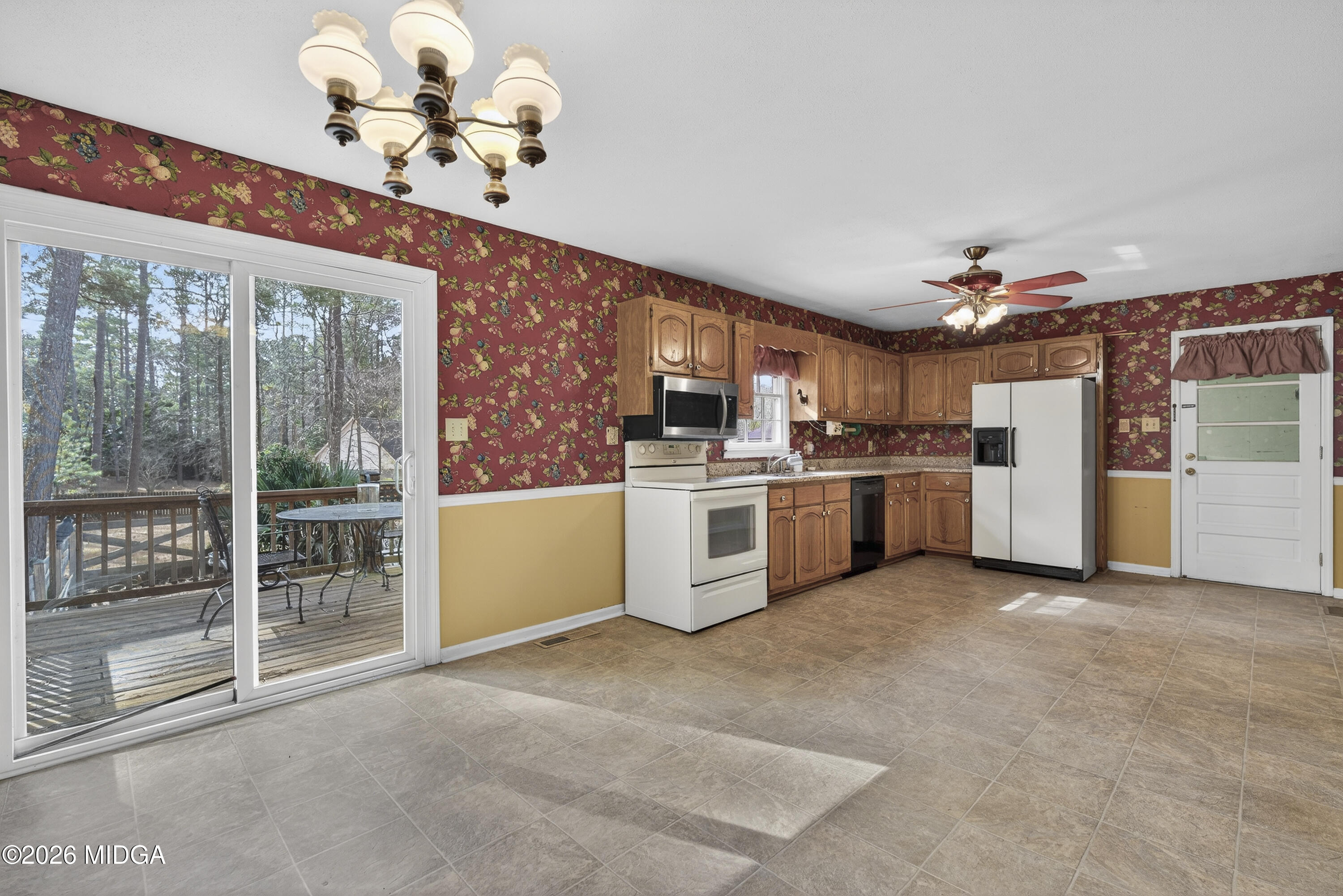 337 Highway 18 Gray, GA 31032 - Photo 21 of 50 a view of a kitchen with a sink dishwasher and a refrigerator