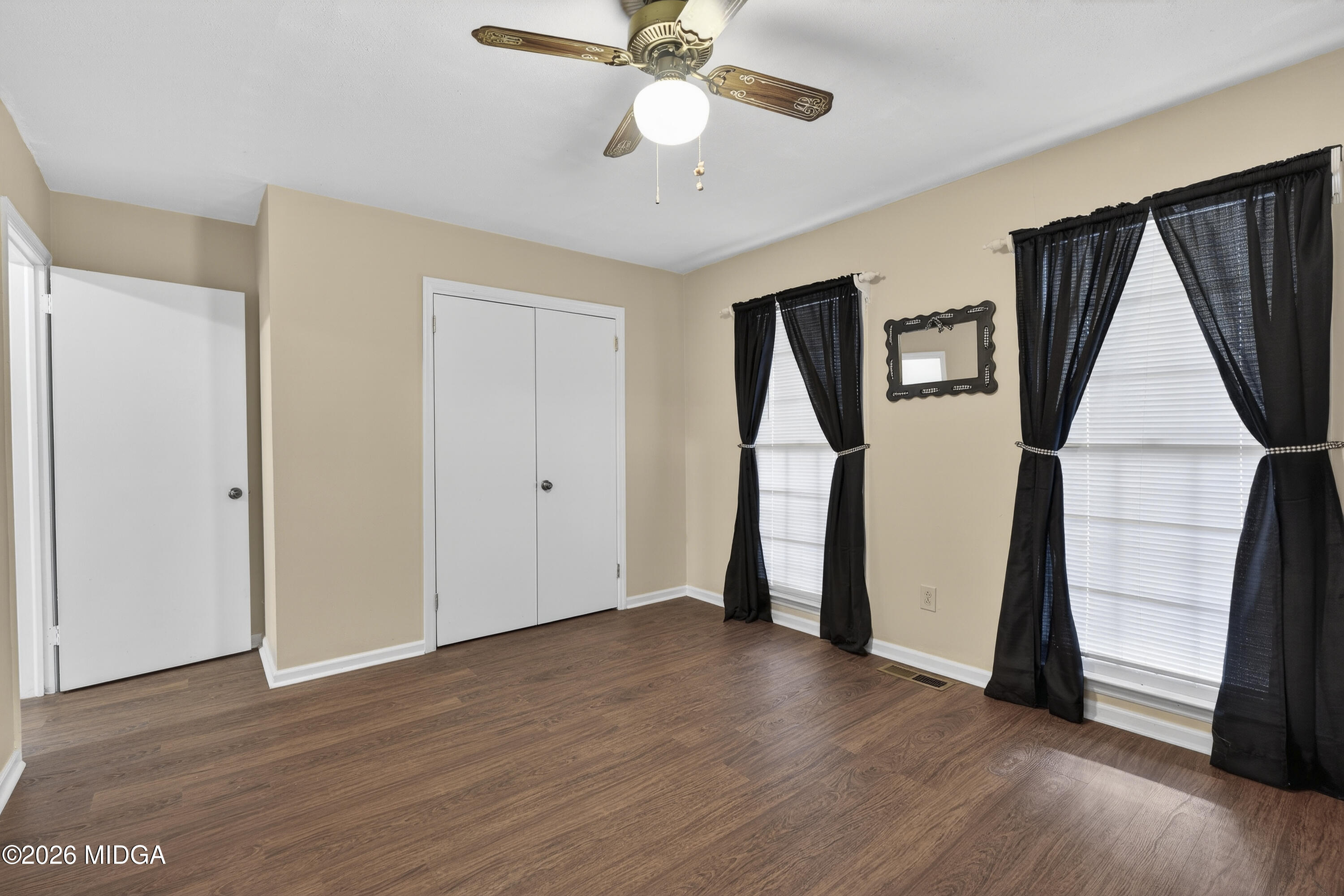 337 Highway 18 Gray, GA 31032 - Photo 31 of 50 a view of empty room with wooden floor and fan