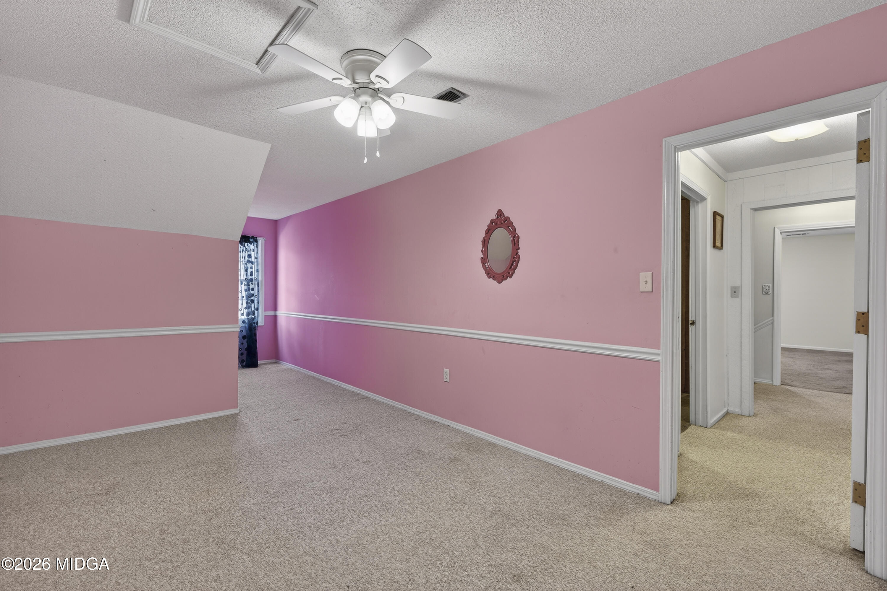 337 Highway 18 Gray, GA 31032 - Photo 37 of 50 an empty room with a fan