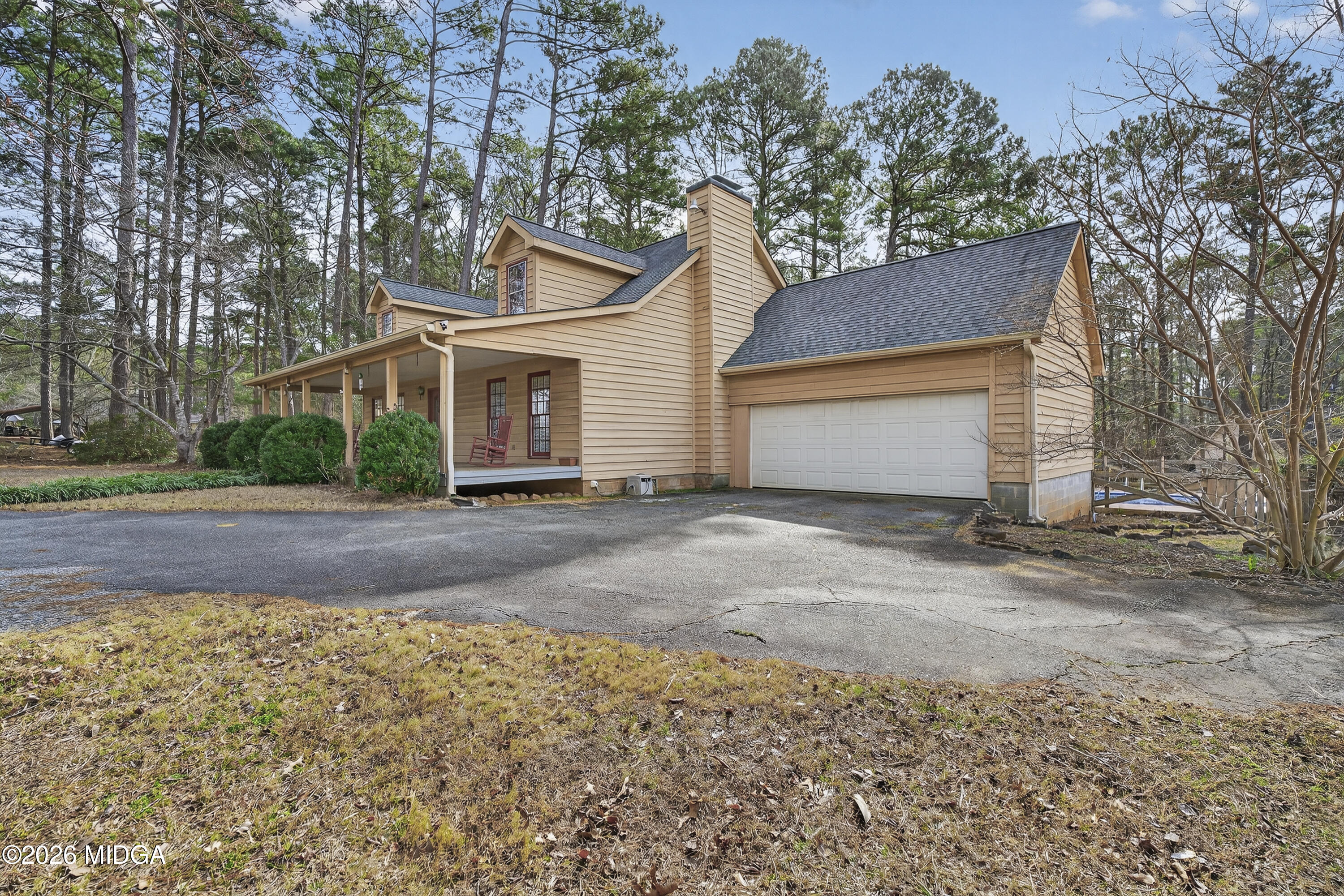 337 Highway 18 Gray, GA 31032 - Photo 4 of 50 front view of a house with a yard