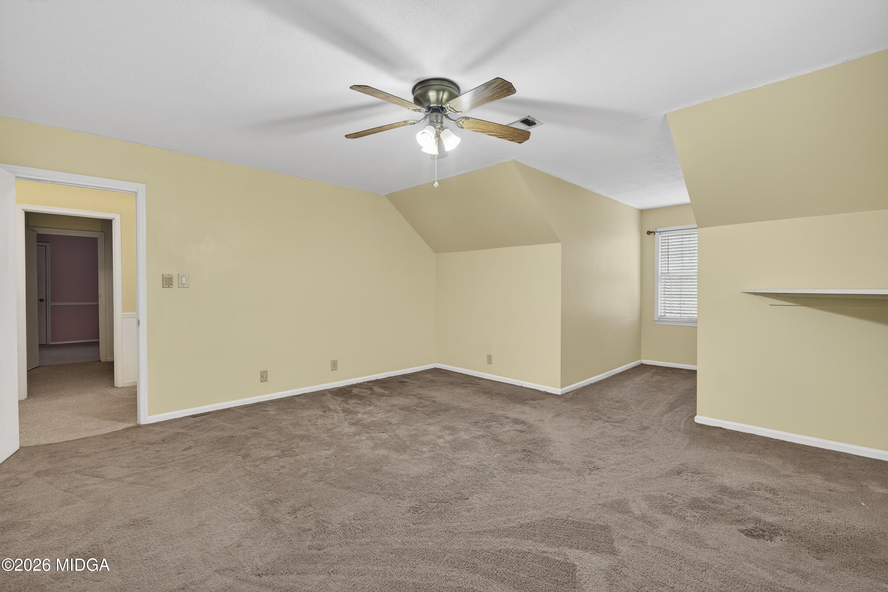 337 Highway 18 Gray, GA 31032 - Photo 45 of 50 an empty room with closet and a ceiling fan