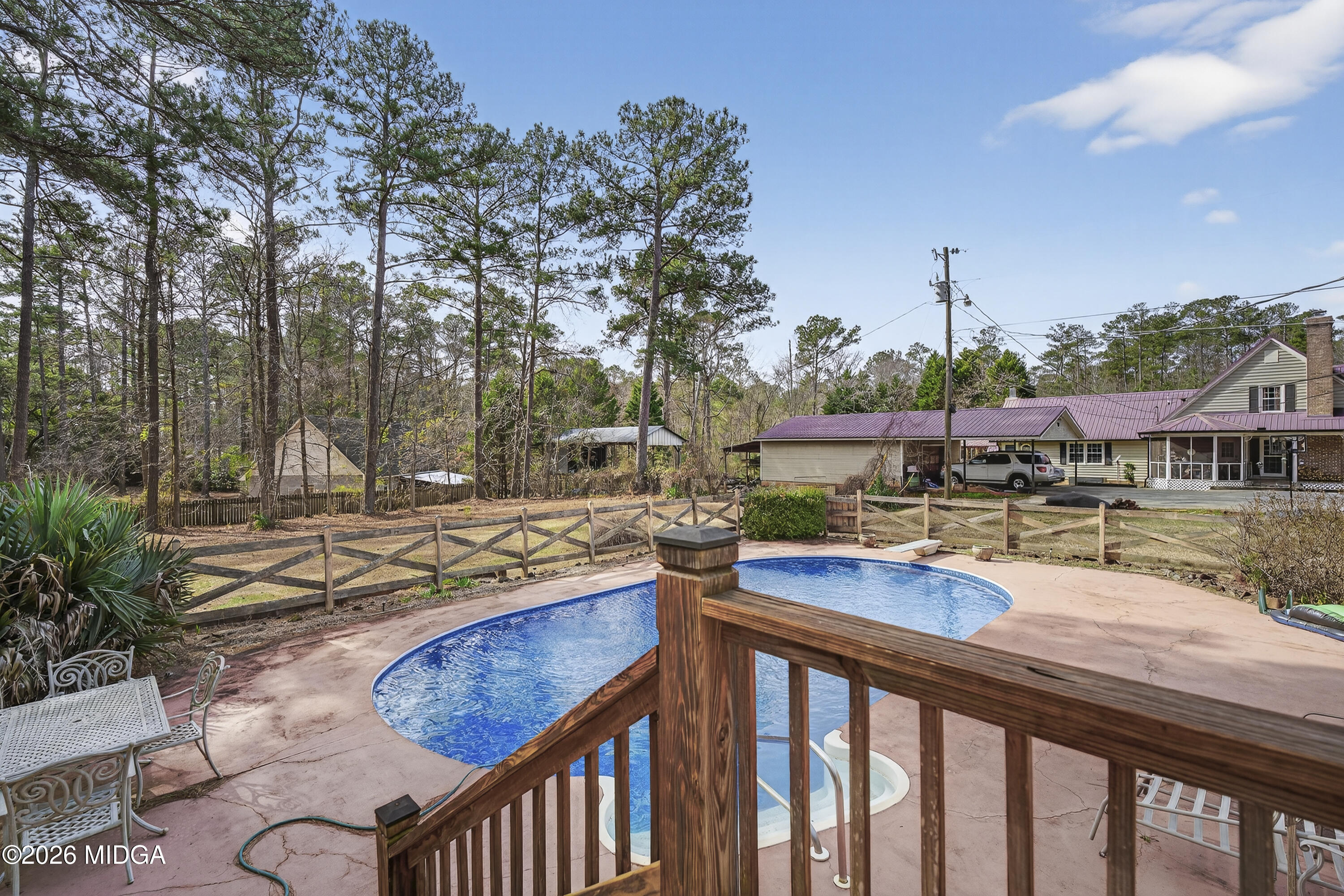 337 Highway 18 Gray, GA 31032 - Photo 49 of 50 a view of a swimming pool with lounge chairs in patio