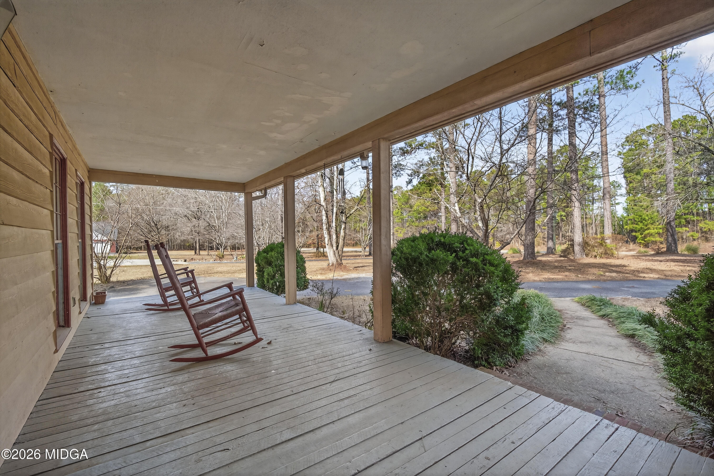 337 Highway 18 Gray, GA 31032 - Photo 8 of 50 a living room with large windows and wooden floor