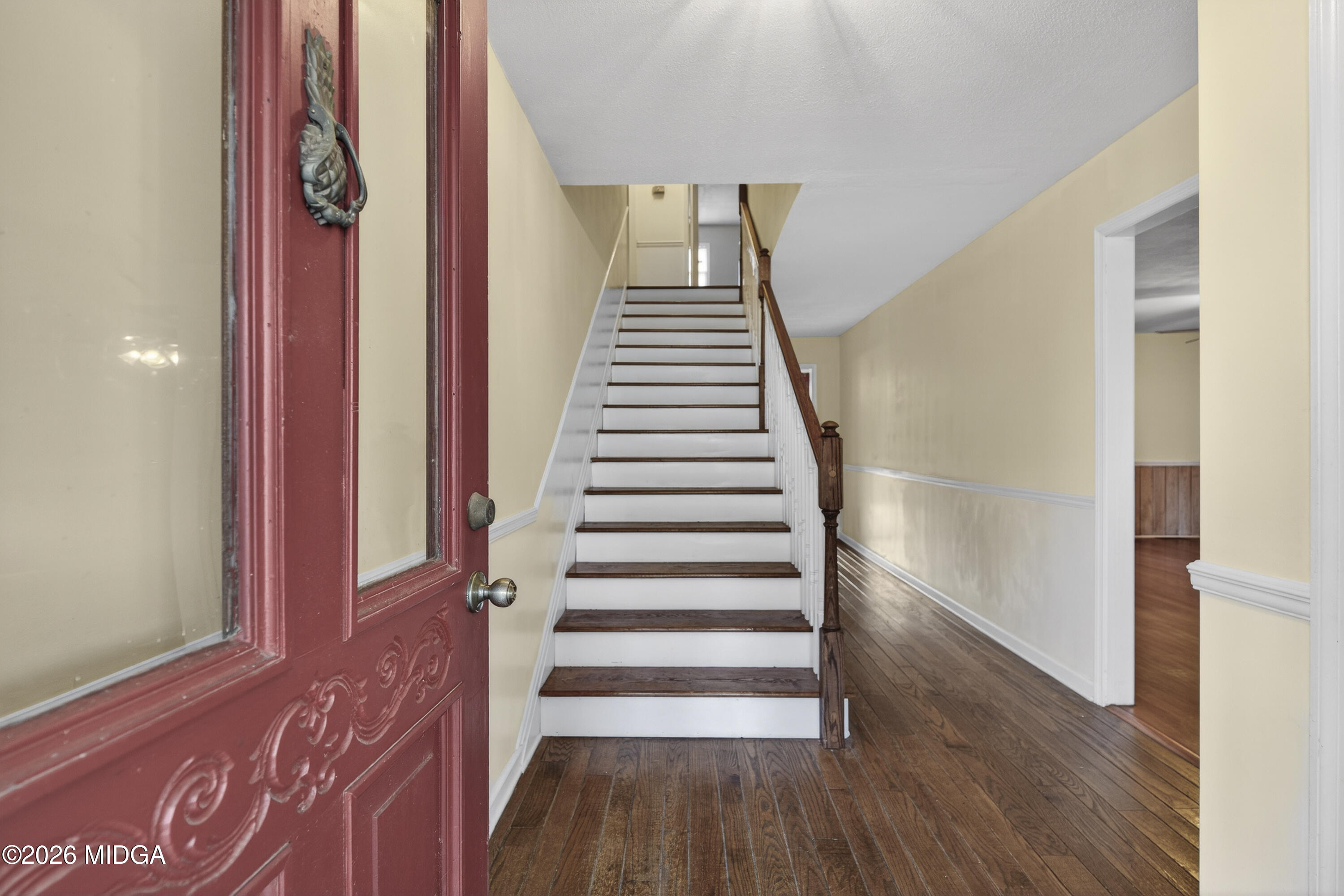 337 Highway 18 Gray, GA 31032 - Photo 9 of 50 a view of a hallway with wooden floor and stairs