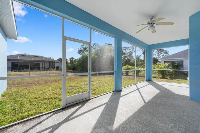 a view of water heater room with a ceiling fan
