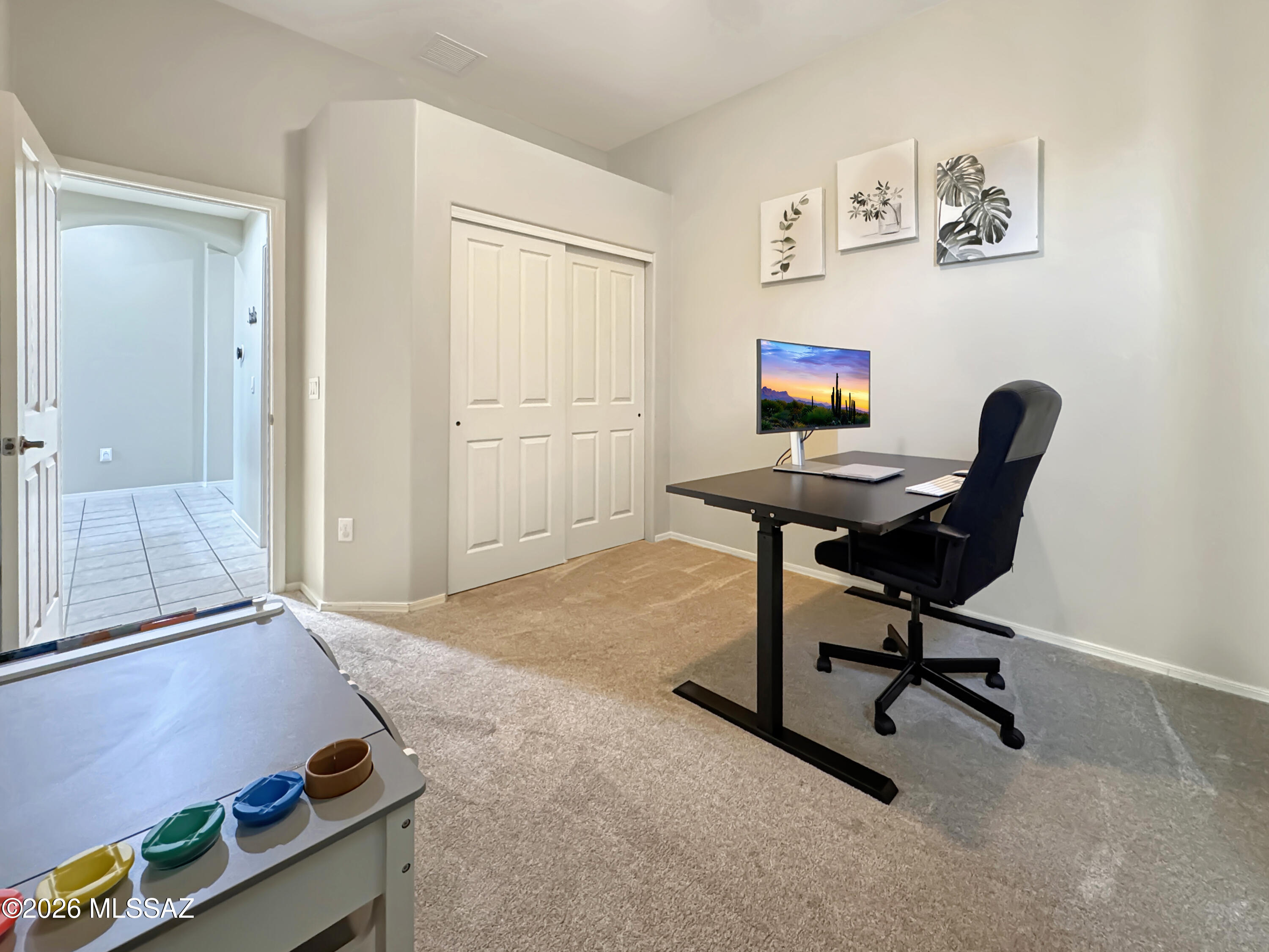 10835 South Heart Break Ridge Place Vail, AZ 85641 - Photo 32 of 49 a view of a workspace with furniture and a window