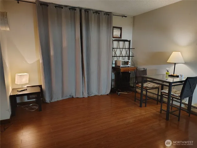 a workspace with furniture and window