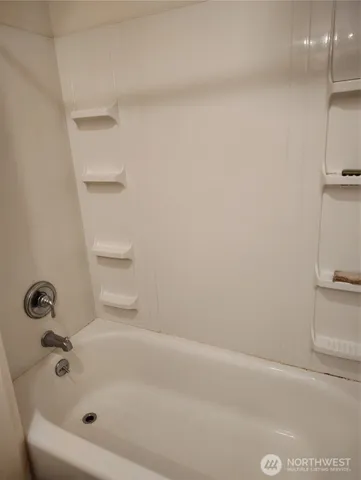 a bathroom with a tub