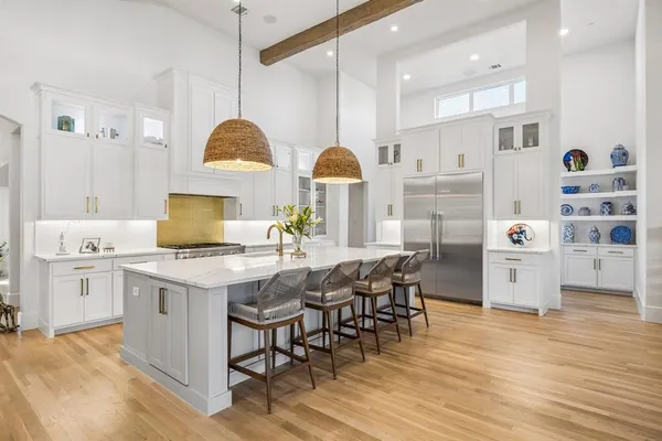 a bathroom with sink a vanity and a bathtub
