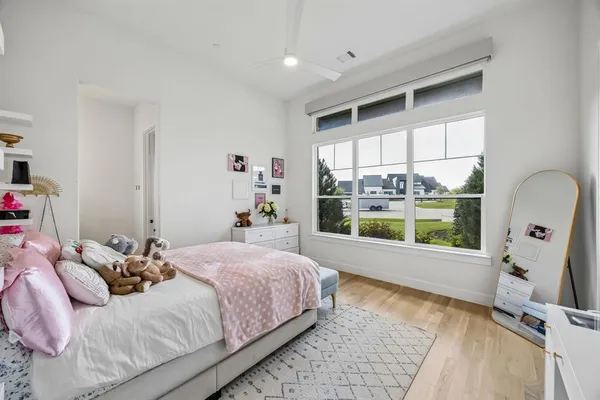 a bathroom with a sink vanity and mirror