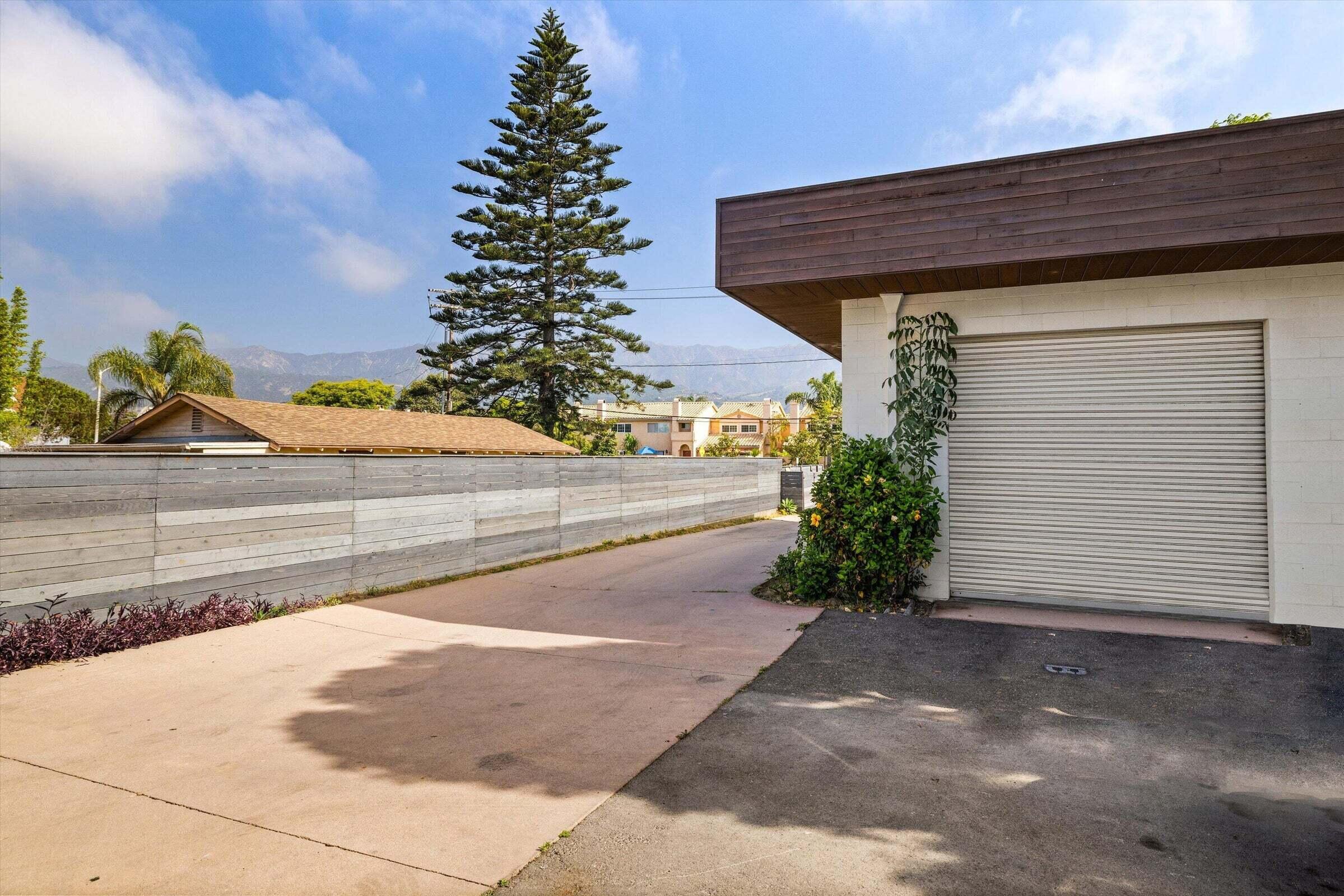 4237 Carpinteria Avenue, Unit B Carpinteria, CA 93013 - Photo 6 of 16 a view of a house with a yard