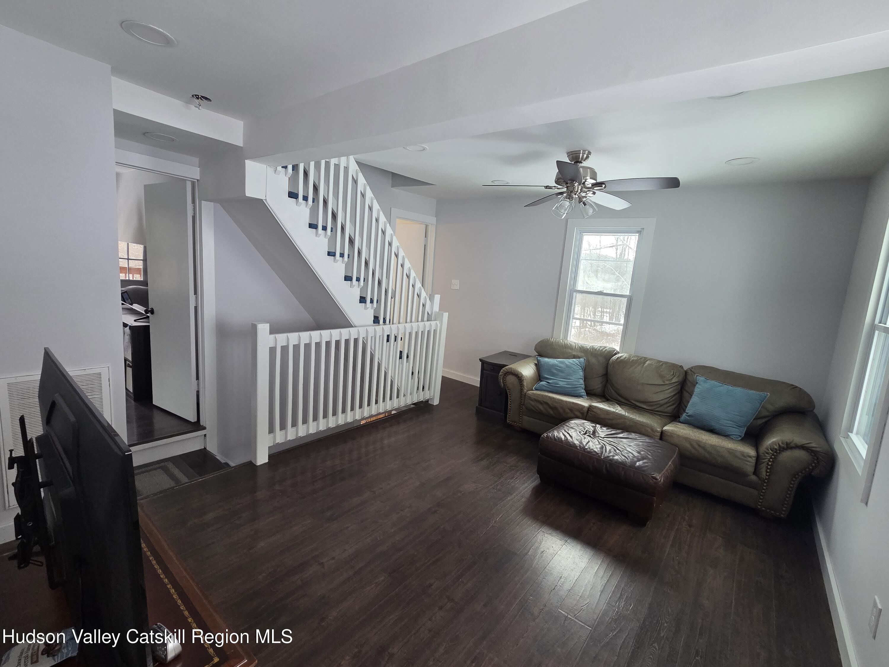61 Cottekill Road Rosendale, NY 12419 - Photo 12 of 32 a living room with furniture and a window