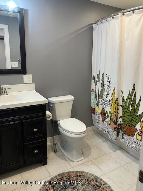 61 Cottekill Road Rosendale, NY 12419 - Photo 15 of 32 a bathroom with a toilet a sink and a mirror