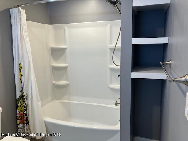 61 Cottekill Road Rosendale, NY 12419 - Photo 16 of 32 a bathroom with a bathtub and a shower
