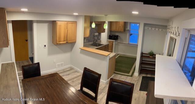 61 Cottekill Road Rosendale, NY 12419 - Photo 4 of 32 a view of kitchen with wooden floor and electronic appliances