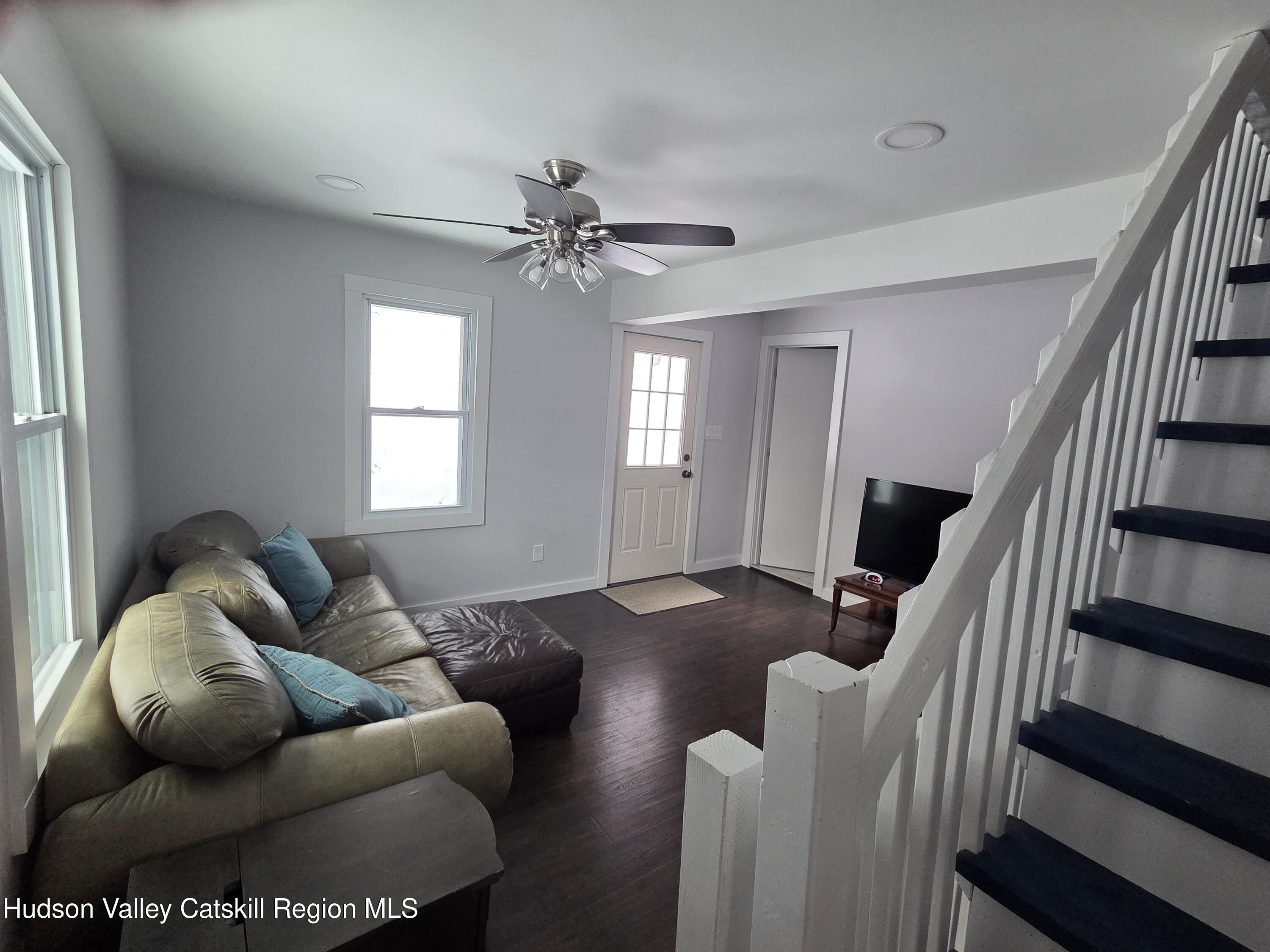 61 Cottekill Road Rosendale, NY 12419 - Photo 10 of 32 a living room with furniture and a window